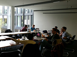 CMZoom members discussing preliminary data at a face-to-face meeting at ESO.
