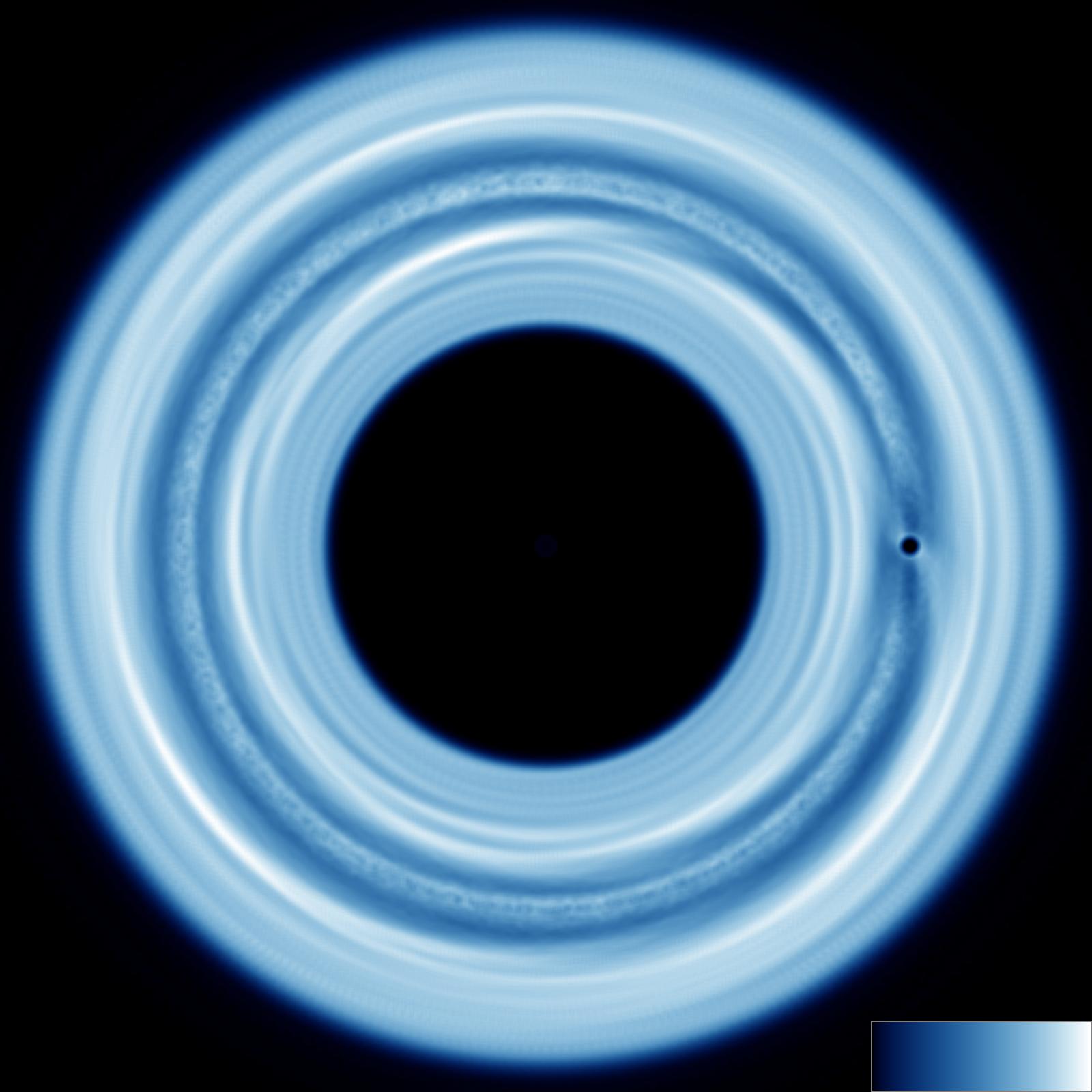 Migrating planet in a disk of planetesimals